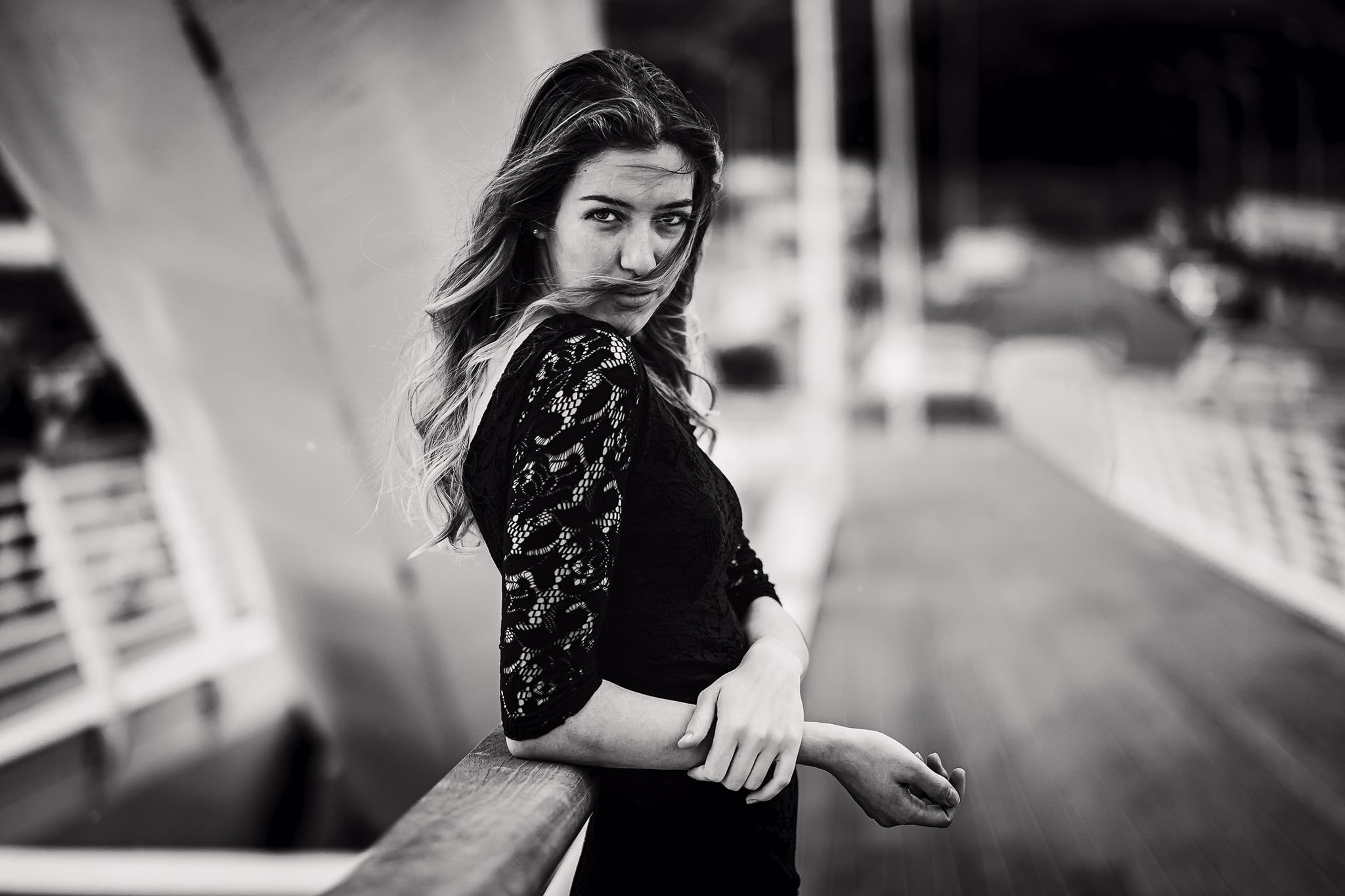 High-contrast portrait in profile emphasizing texture, shadow, and clean composition